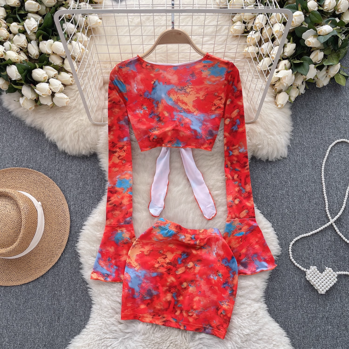 Floral trumpet sleeve top women's short section navel bag hip skirt two-piece suit summer YM400