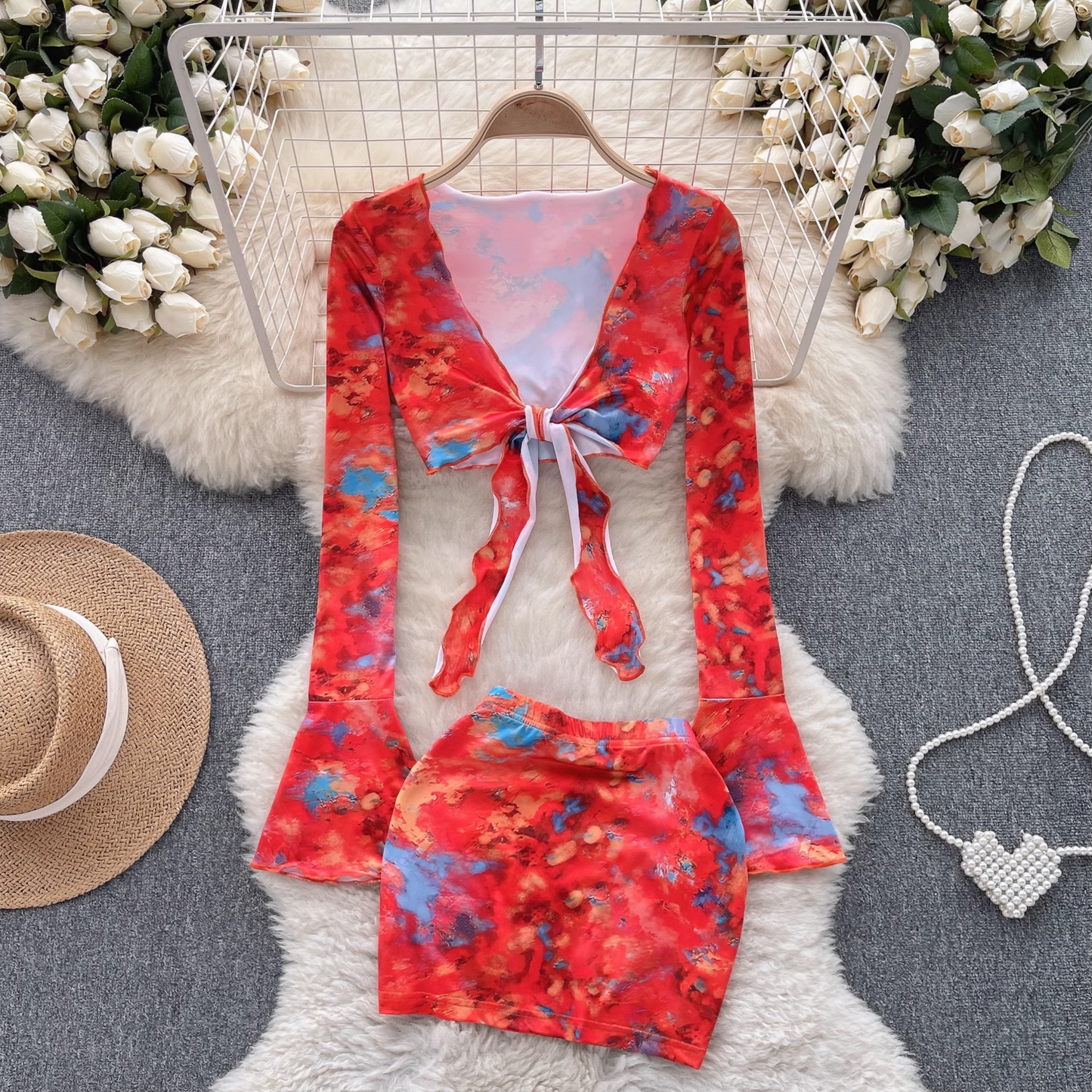 Floral trumpet sleeve top women's short section navel bag hip skirt two-piece suit summer YM400