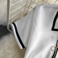 Retro short-sleeved contrasting color POLO collar A-line fluffy dress YM281