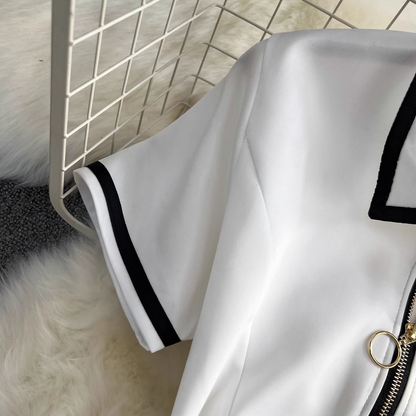 Retro short-sleeved contrasting color POLO collar A-line fluffy dress YM281